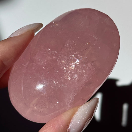 dark pink rose quartz palm asterism crystals