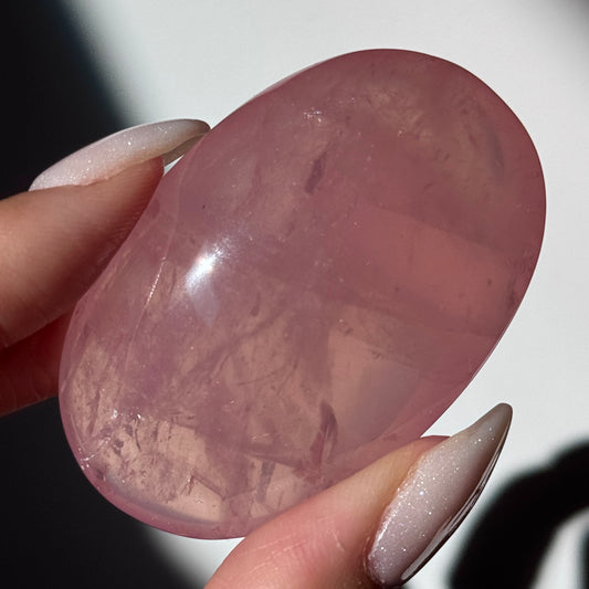 dark pink rose quartz palm asterism crystals