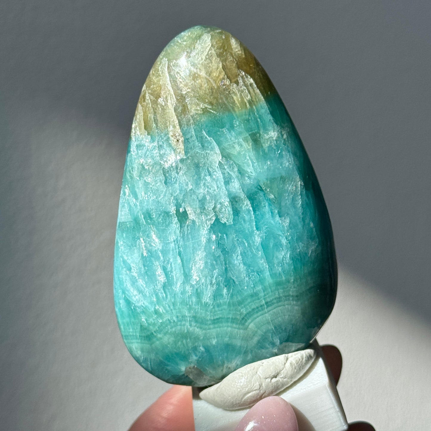polished blue green brucite freeform