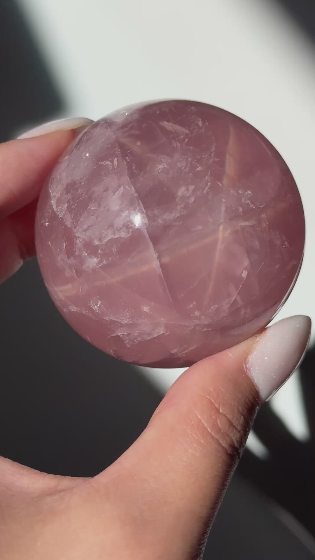 dark pink rose quartz sphere asterism crystals