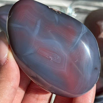 mozambique strawberry agate freeform palm polished agate stone