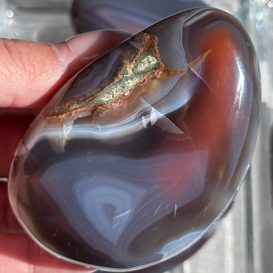 mozambique strawberry agate freeform palm polished agate stone