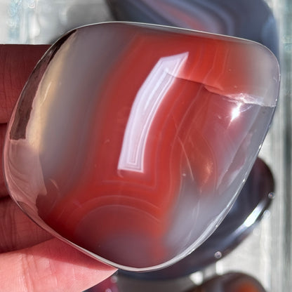 mozambique strawberry agate freeform palm polished agate stone