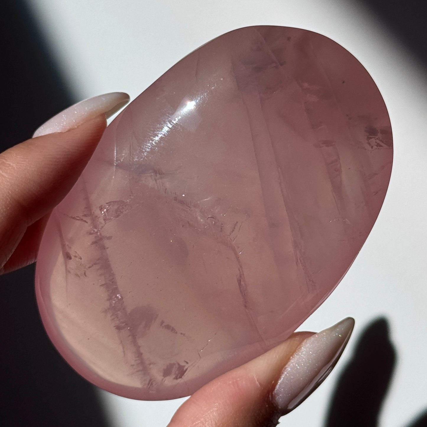 dark pink rose quartz palm asterism crystals