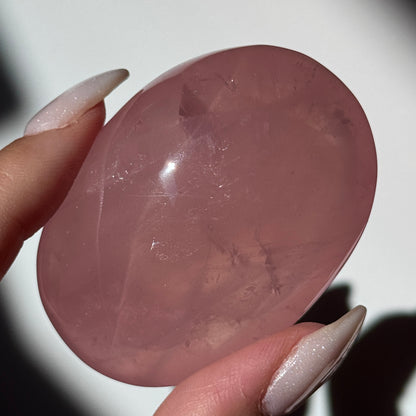 dark pink rose quartz palm asterism crystals