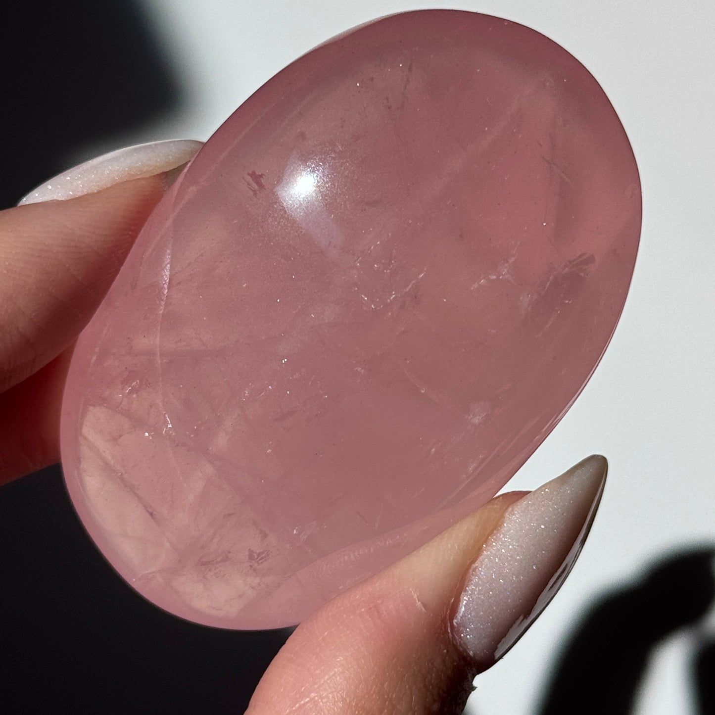 dark pink rose quartz palm asterism crystals