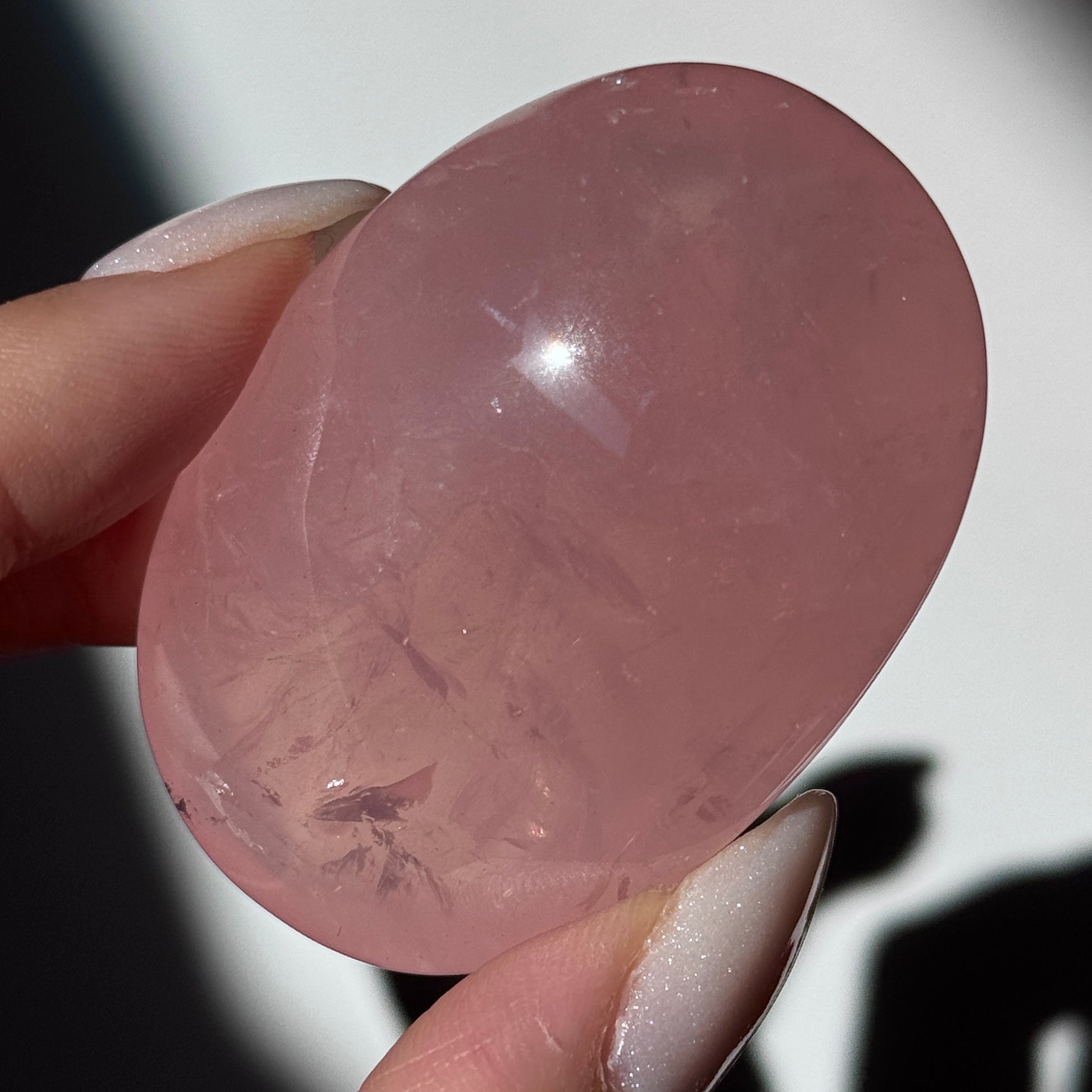 dark pink rose quartz palm asterism crystals