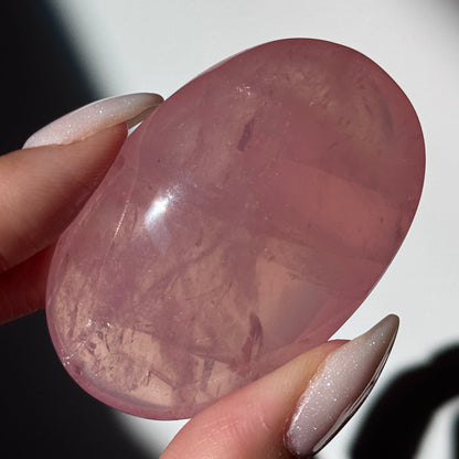 dark pink rose quartz palm asterism crystals