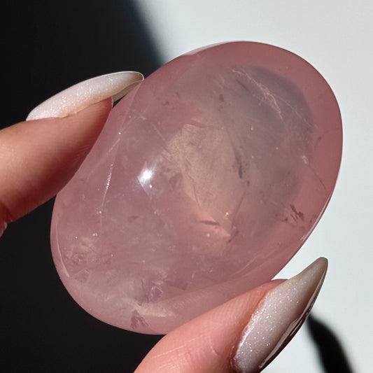 dark pink rose quartz palm asterism crystals