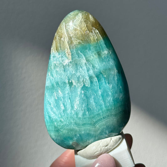 polished blue green brucite freeform