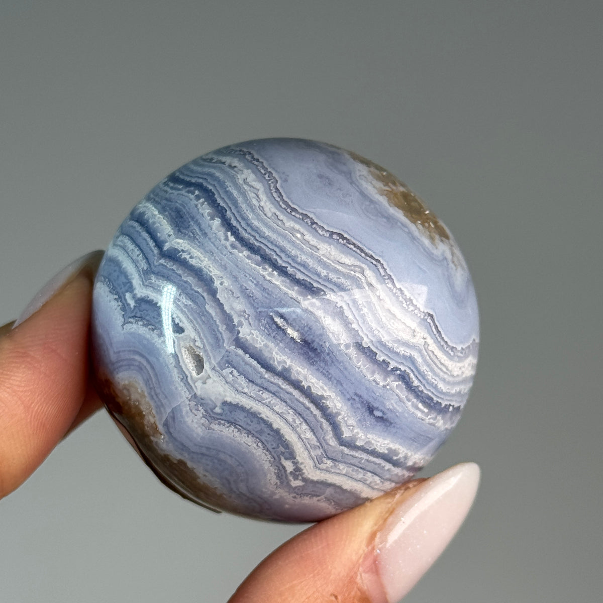 Blue Lace Agate Sphere #1, alternate view showing blue and white wavy bands.