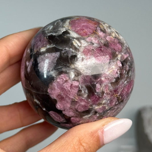 Rubellite (Pink Tourmaline) with Smoky Quartz Sphere #12, alternate view showing pink, black and cream mineral patterns.