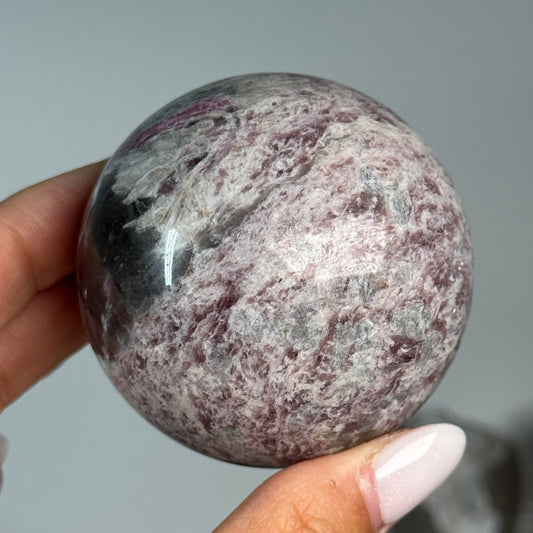 Rubellite (Pink Tourmaline) with Smoky Quartz Sphere #5, alternate view showing pink, black and cream mineral patterns.