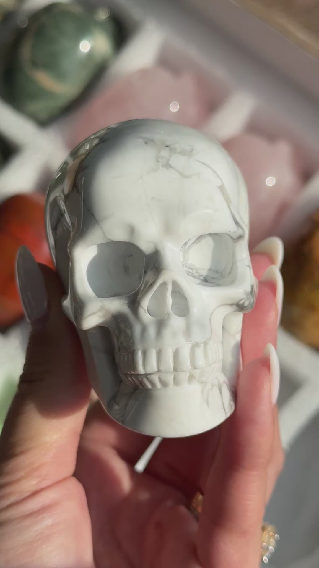 Video of Skull Carving - Howlite #17, showing the carved details and white coloring with gray branching veins.