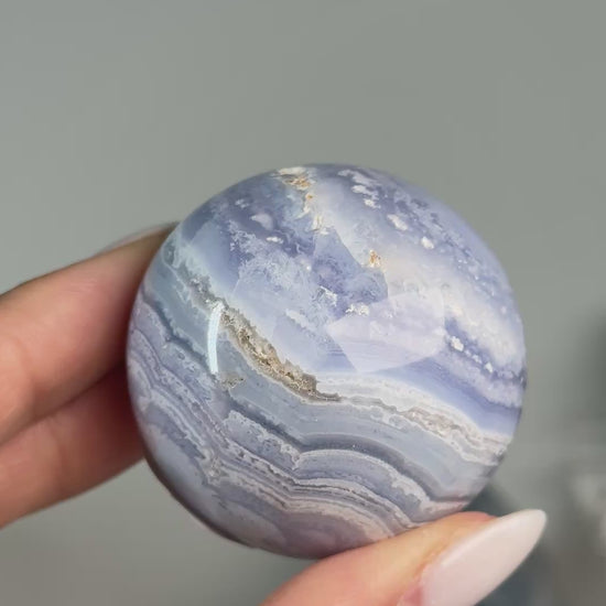 Video of Blue Lace Agate Sphere #5, showing blue and white banding across the polished sphere.