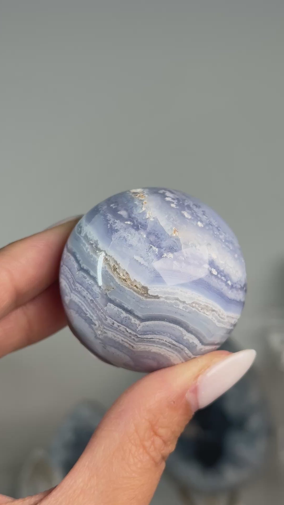 Video of Blue Lace Agate Sphere #5, showing blue and white banding across the polished sphere.