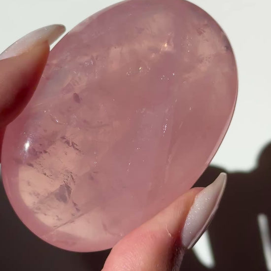 dark pink rose quartz palm asterism crystals