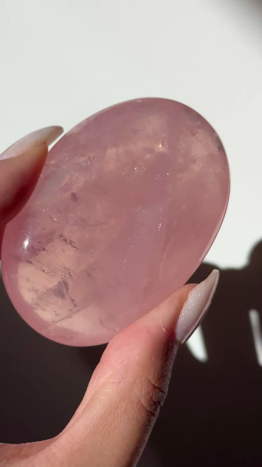 dark pink rose quartz palm asterism crystals