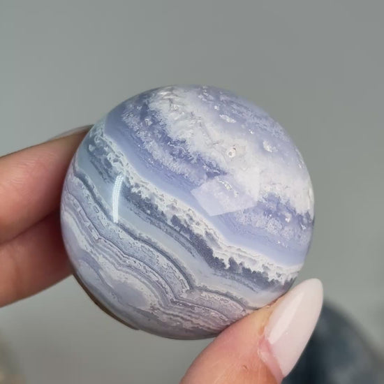 Video of Blue Lace Agate Sphere #3, showing blue and white banding across the polished sphere.