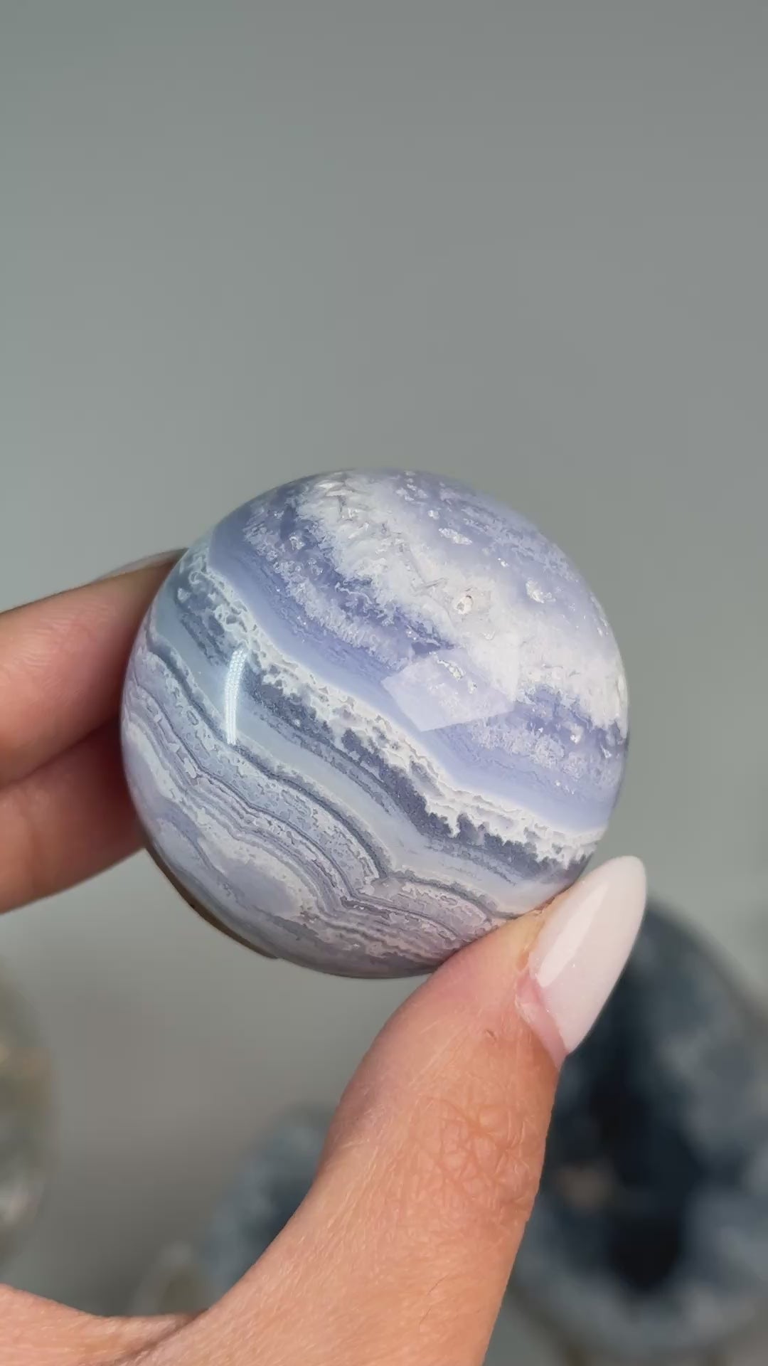 Video of Blue Lace Agate Sphere #3, showing blue and white banding across the polished sphere.