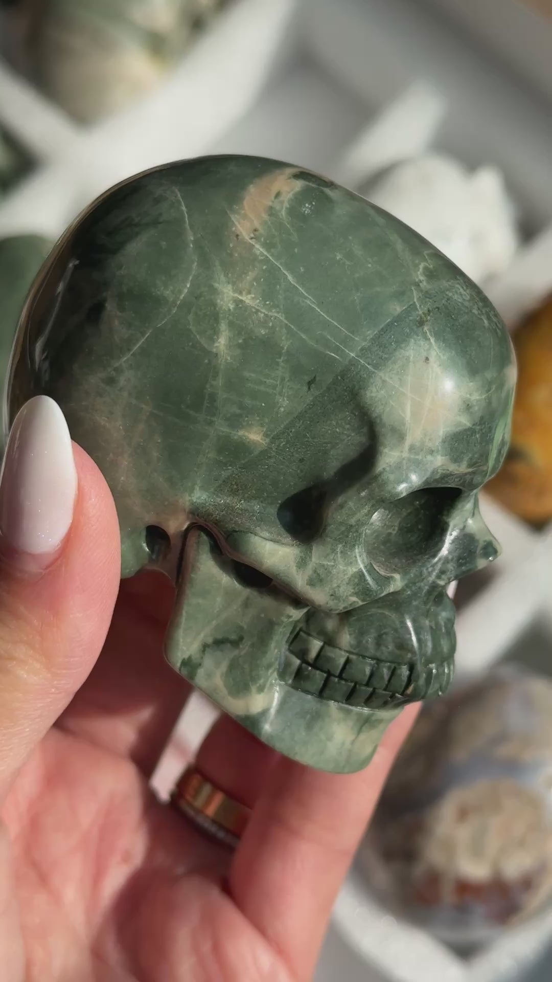 Video of Skull Carving - Green Dragon Jasper #2, showing the carved details and deep green coloring with pale mineral patches.