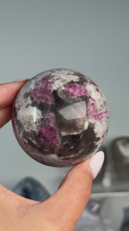 Video of Rubellite (Pink Tourmaline) with Smoky Quartz Sphere #5, showing pink, black and cream mineral patterns across the polished sphere.